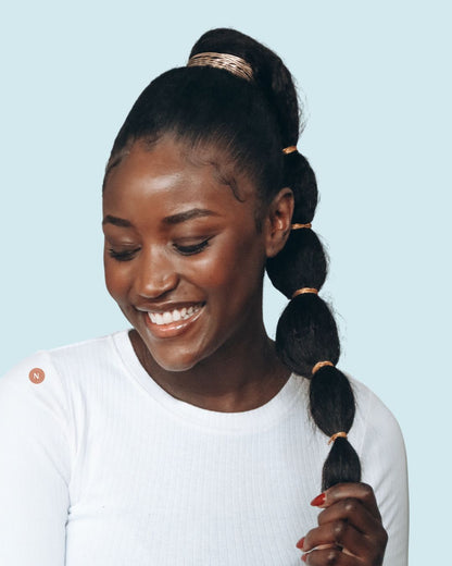 PONYTAIL CRÉPUE LISSÉE